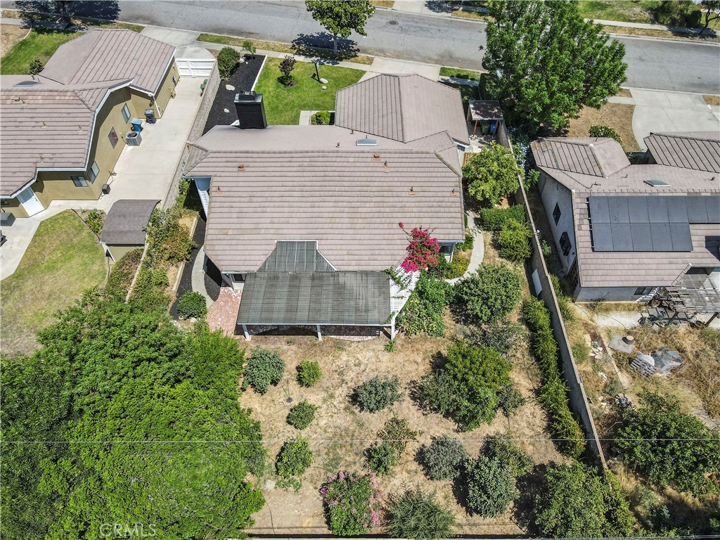 3367 Lathrop Avenue Simi Valley, CA 93063 - Photo 4 of 36 an aerial view of a house with garden space and street view