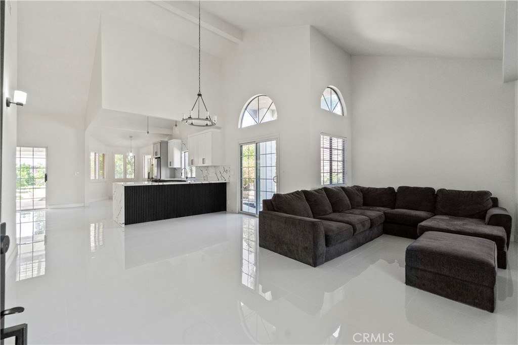 3367 Lathrop Avenue Simi Valley, CA 93063 - Photo 5 of 36 a living room with furniture and a chandelier