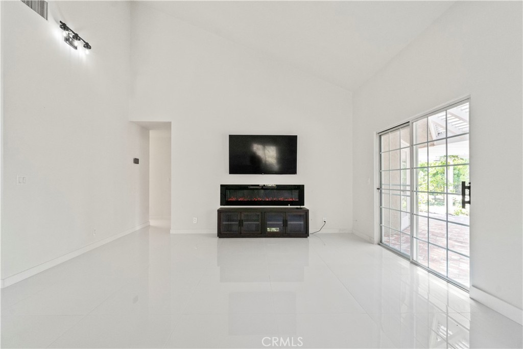 3367 Lathrop Avenue Simi Valley, CA 93063 - Photo 9 of 36 a living room with furniture and a flat screen tv