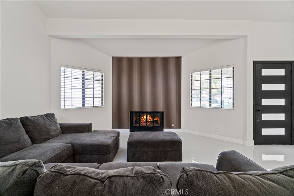 3367 Lathrop Avenue Simi Valley, CA 93063 - Photo 10 of 36 a living room with furniture and a window