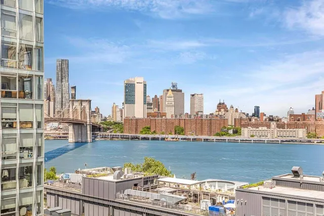 a view of a city with tall buildings