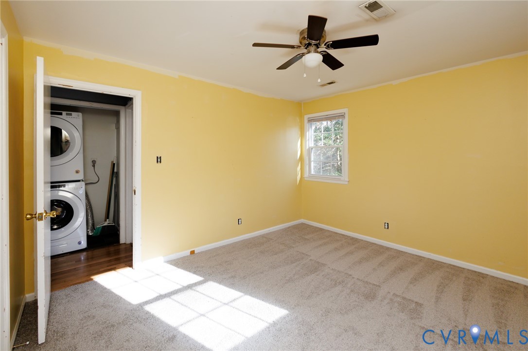 11515 Patillo Road Dewitt, VA 23840 - Photo 16 of 35 a view of a livingroom with a window and a ceiling fan
