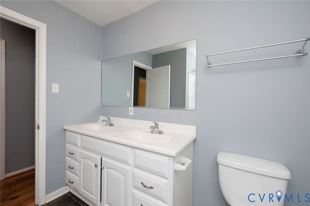 11515 Patillo Road Dewitt, VA 23840 - Photo 20 of 35 a bathroom with a toilet sink and mirror