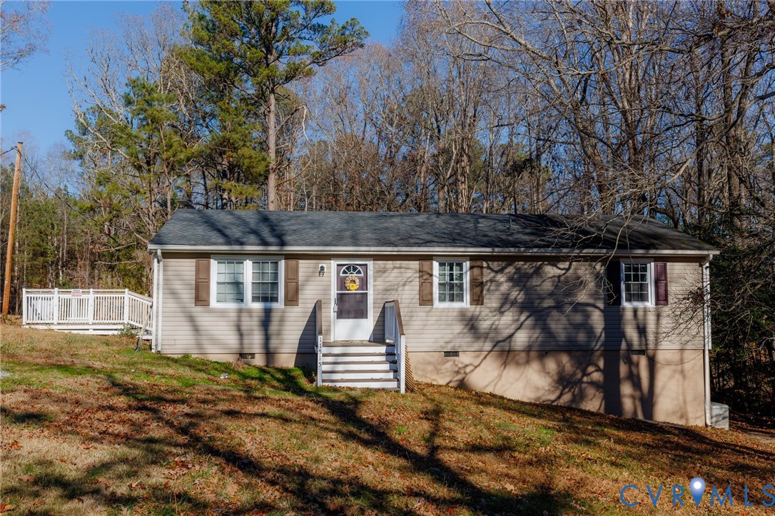 11515 Patillo Road Dewitt, VA 23840 - Photo 2 of 35 a view of a house with backyard and tree