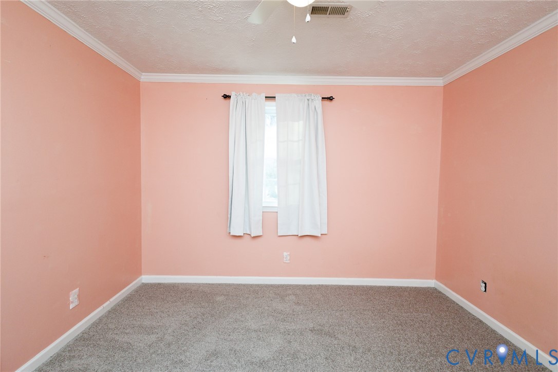 11515 Patillo Road Dewitt, VA 23840 - Photo 22 of 35 a view of an empty room with a window