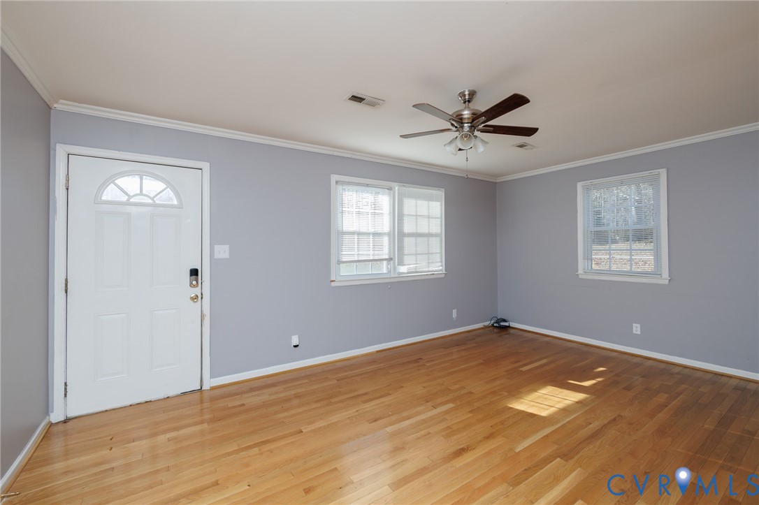 11515 Patillo Road Dewitt, VA 23840 - Photo 3 of 35 a view of a room with a ceiling fan and a window