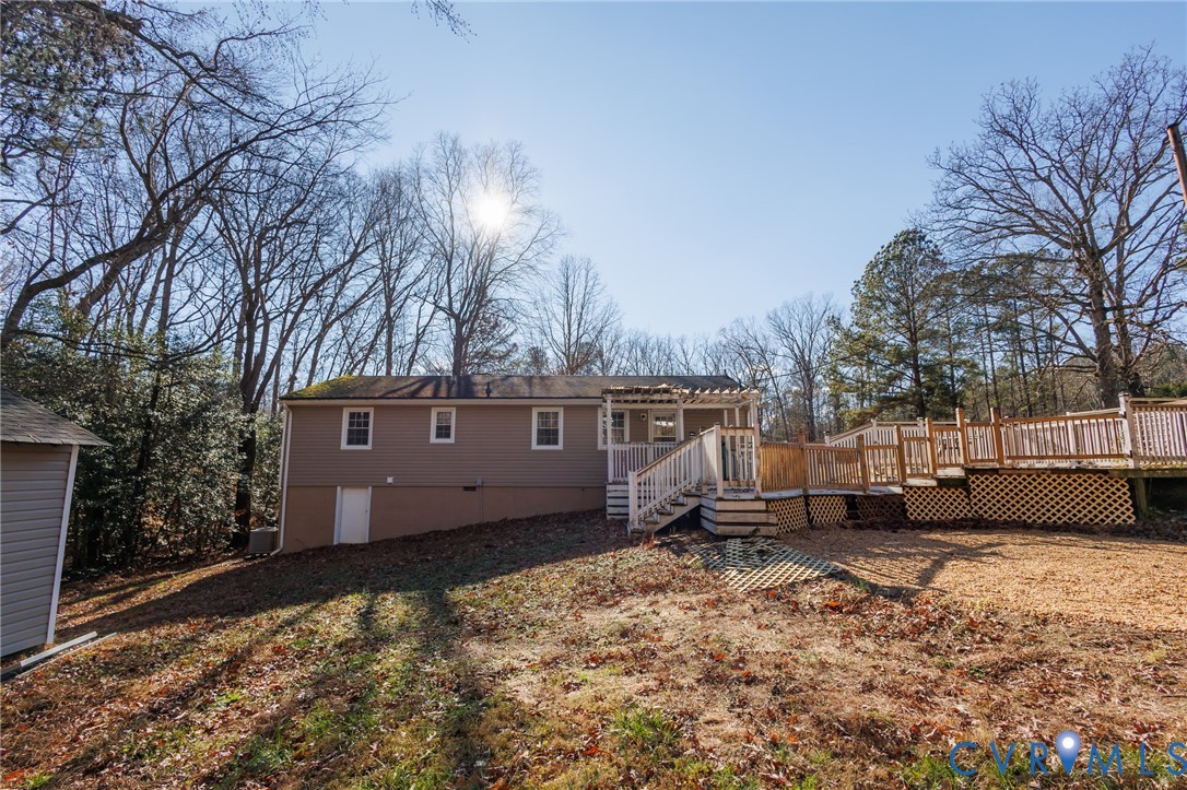 11515 Patillo Road Dewitt, VA 23840 - Photo 32 of 35 a view of a house with a yard covered in snow