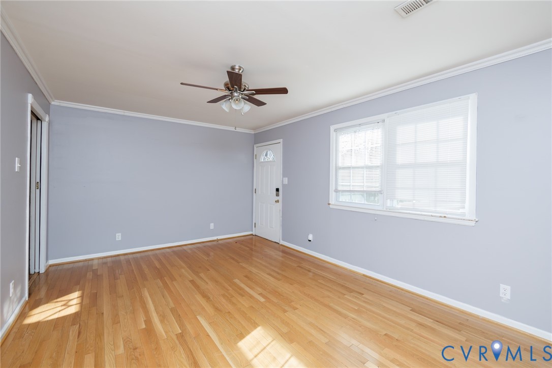 11515 Patillo Road Dewitt, VA 23840 - Photo 4 of 35 a view of room with window and ceiling fan