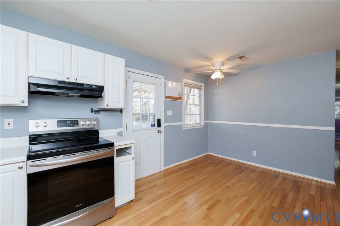 11515 Patillo Road Dewitt, VA 23840 - Photo 8 of 35 a kitchen with a stove and a microwave