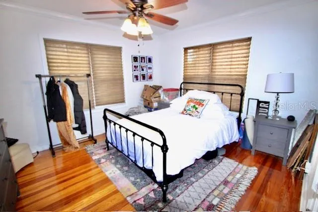 a bed room with a bed and a window