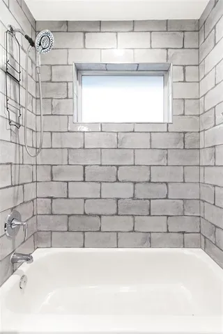 a bathroom with a bathtub