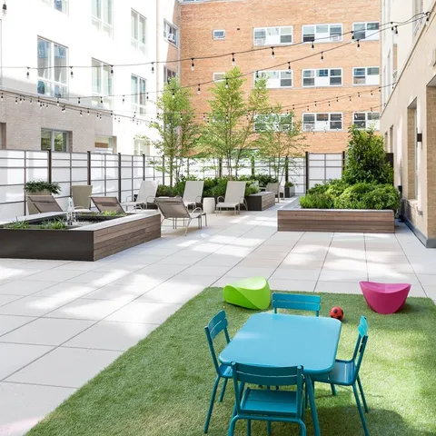 a view of a balcony with chairs
