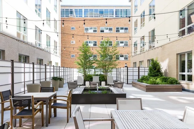 a view of a terrace with furniture