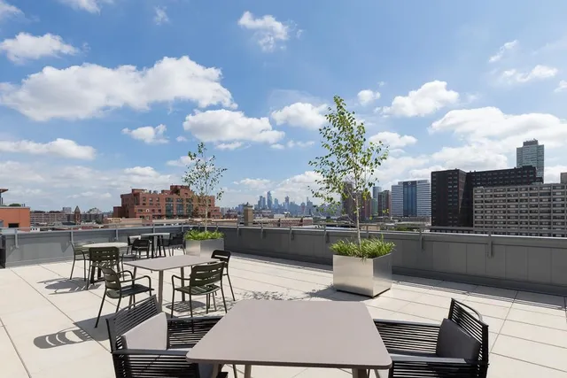 a view of a city with tall buildings