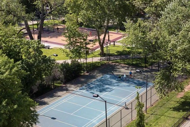 front view of a building with a yard