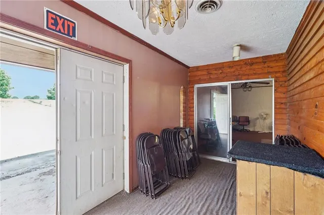 a view of front door with deck