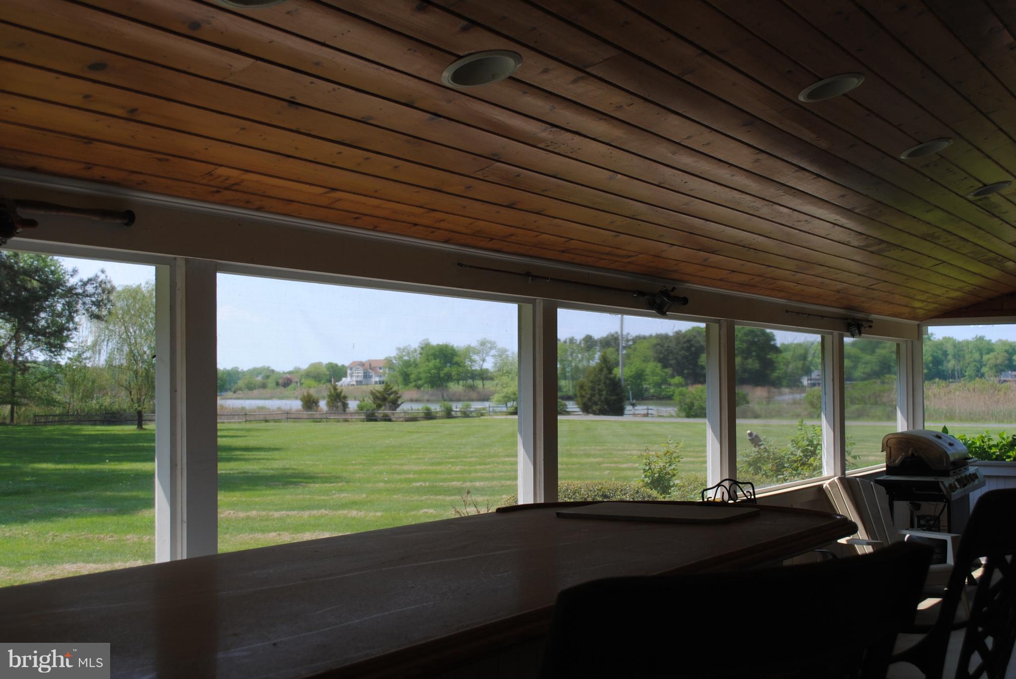 20839 Humphreys Point Road Rock Hall, MD 21661 - Photo 14 of 30 Wet bar in screened porch overlooking the creek