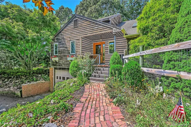 a house view with a garden space