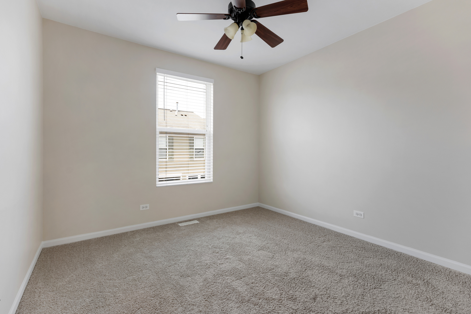 2441 Emily Lane Elgin, IL 60124 - Photo 18 of 27 a view of an empty room with a window