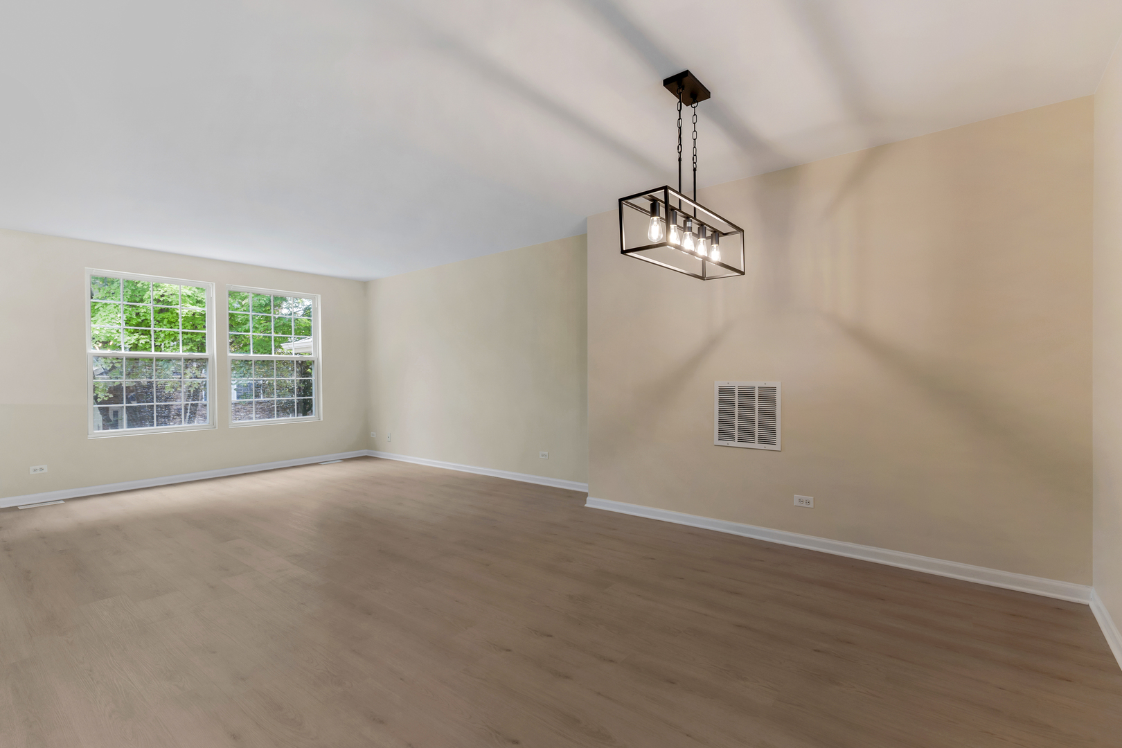 2441 Emily Lane Elgin, IL 60124 - Photo 7 of 27 a view of a room with window and wooden floor