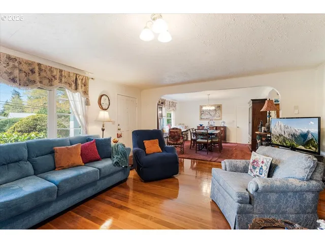 a living room with furniture and a couch
