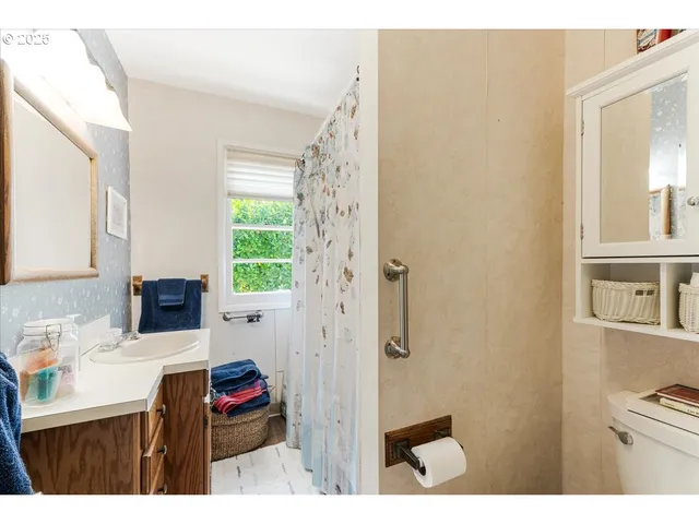 a bathroom with a sink toilet and a bathtub