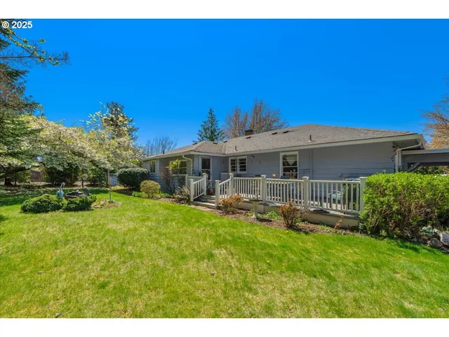 a front view of house with yard and seating area