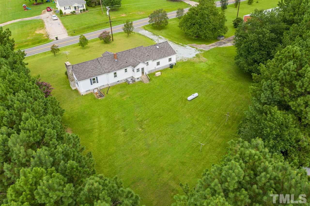 3313 Carpenter Pond Road Durham, NC 27703 - Photo 4 of 30 Expansive property w/ spacious backyard overlooking HOA buffer.