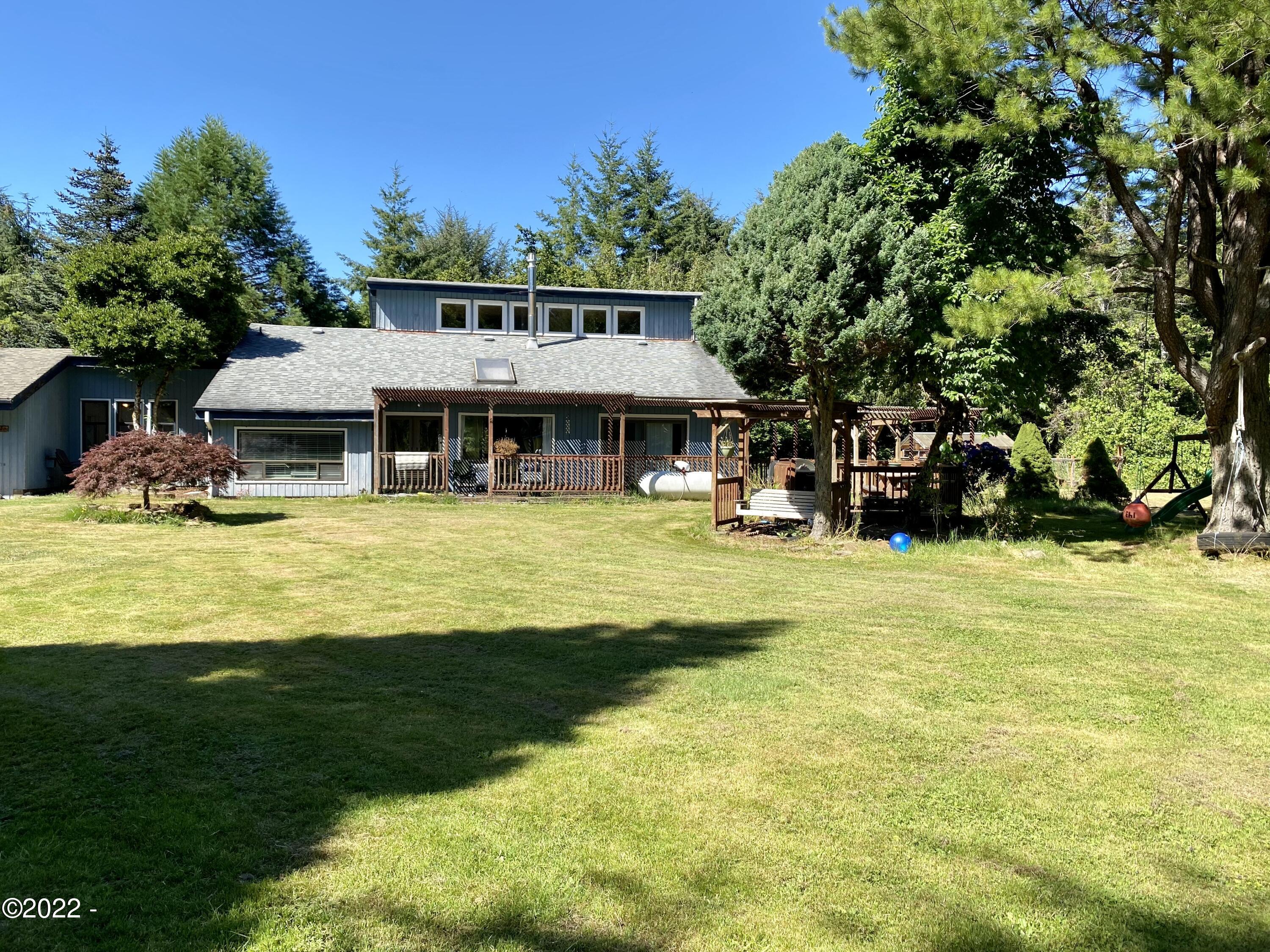 2262 Old River Road Northeast Siletz, OR 97380 - Photo 1 of 18 Front of Home