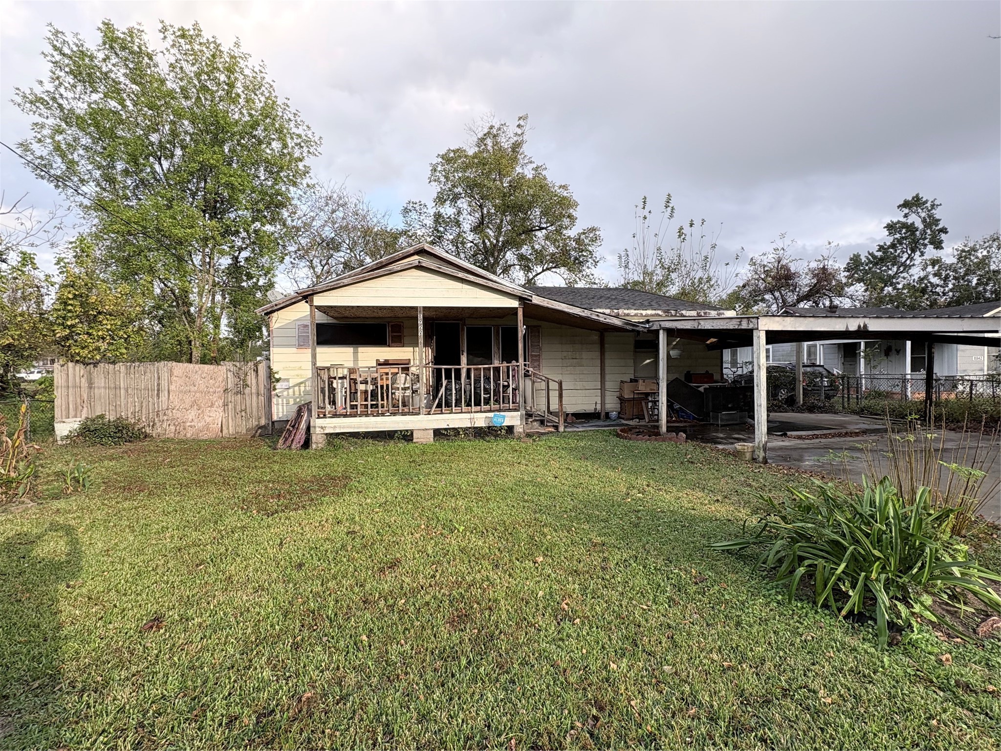 8922 Heatherside Street Houston, TX 77016 - Photo 1 of 6 a front view of a house with garden