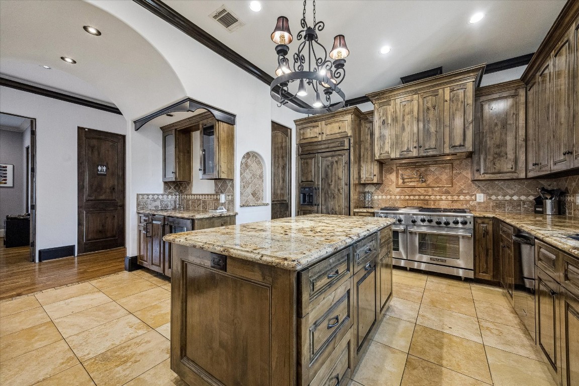 4119 Allen Street Houston, TX 77007 - Photo 13 of 42 Updated kitchen features granite counter tops, island and breakfast bar