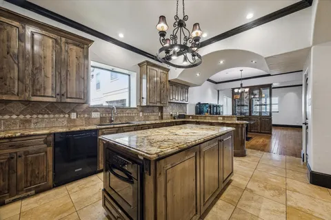 a kitchen with a counter space cabinets and stainless steel appliances