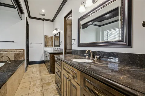 a bathroom with a sink a vanity and a mirror