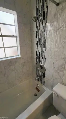 a bathroom with a bathtub