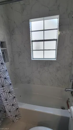 a bathroom with a window