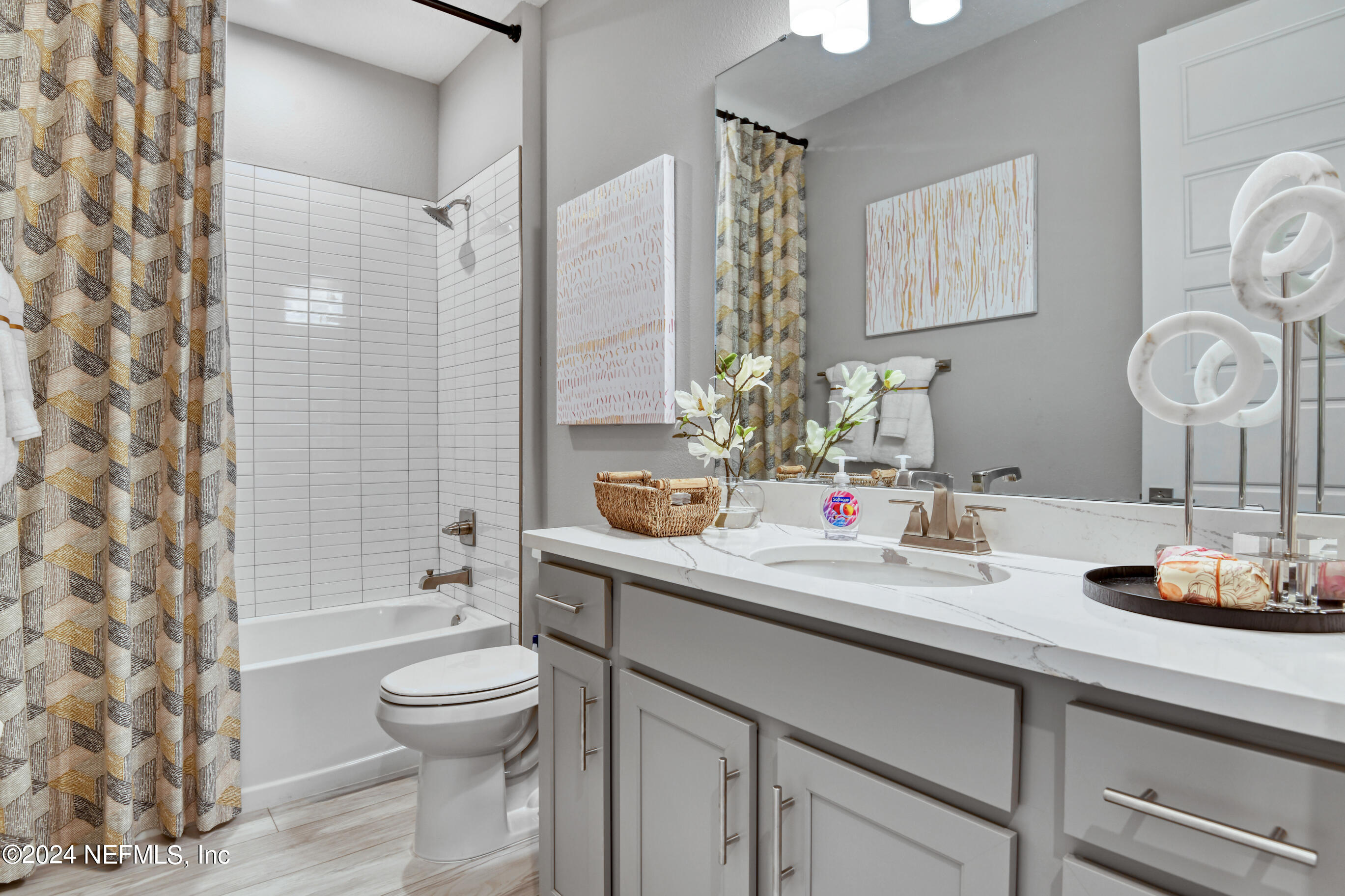 7213 Red Timber Road Jacksonville, FL 32244 - Photo 14 of 17 a bathroom with a sink a toilet and shower