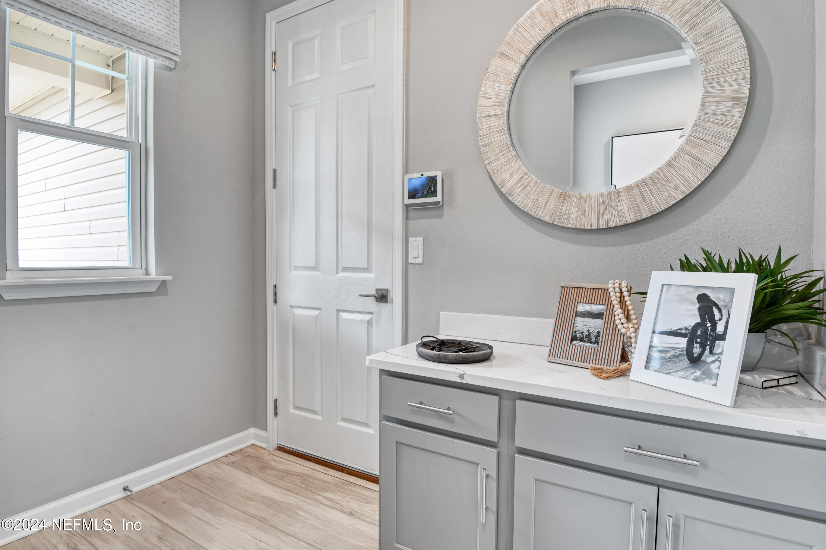7213 Red Timber Road Jacksonville, FL 32244 - Photo 5 of 17 a bathroom with a sink and a mirror