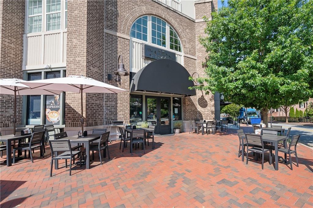 320 Anglin Walk Alpharetta, GA 30009 - Photo 58 of 67 a outdoor space with lots of tables and chairs