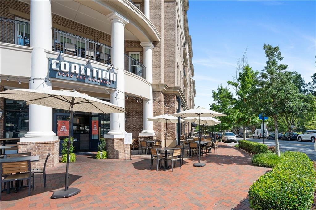 320 Anglin Walk Alpharetta, GA 30009 - Photo 64 of 67 a view of a cafe with sitting area