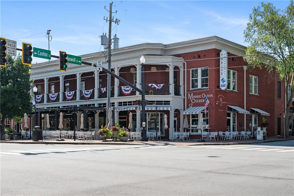 320 Anglin Walk Alpharetta, GA 30009 - Photo 66 of 67 a front view of a building and a street
