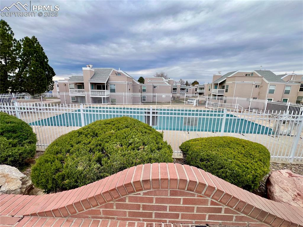 3150 Van Teylingen Drive, Unit E Colorado Springs, CO 80917 - Photo 22 of 24 a view of a garden with a staircase