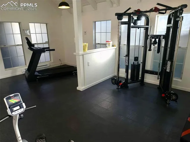 a view of a room with gym equipment
