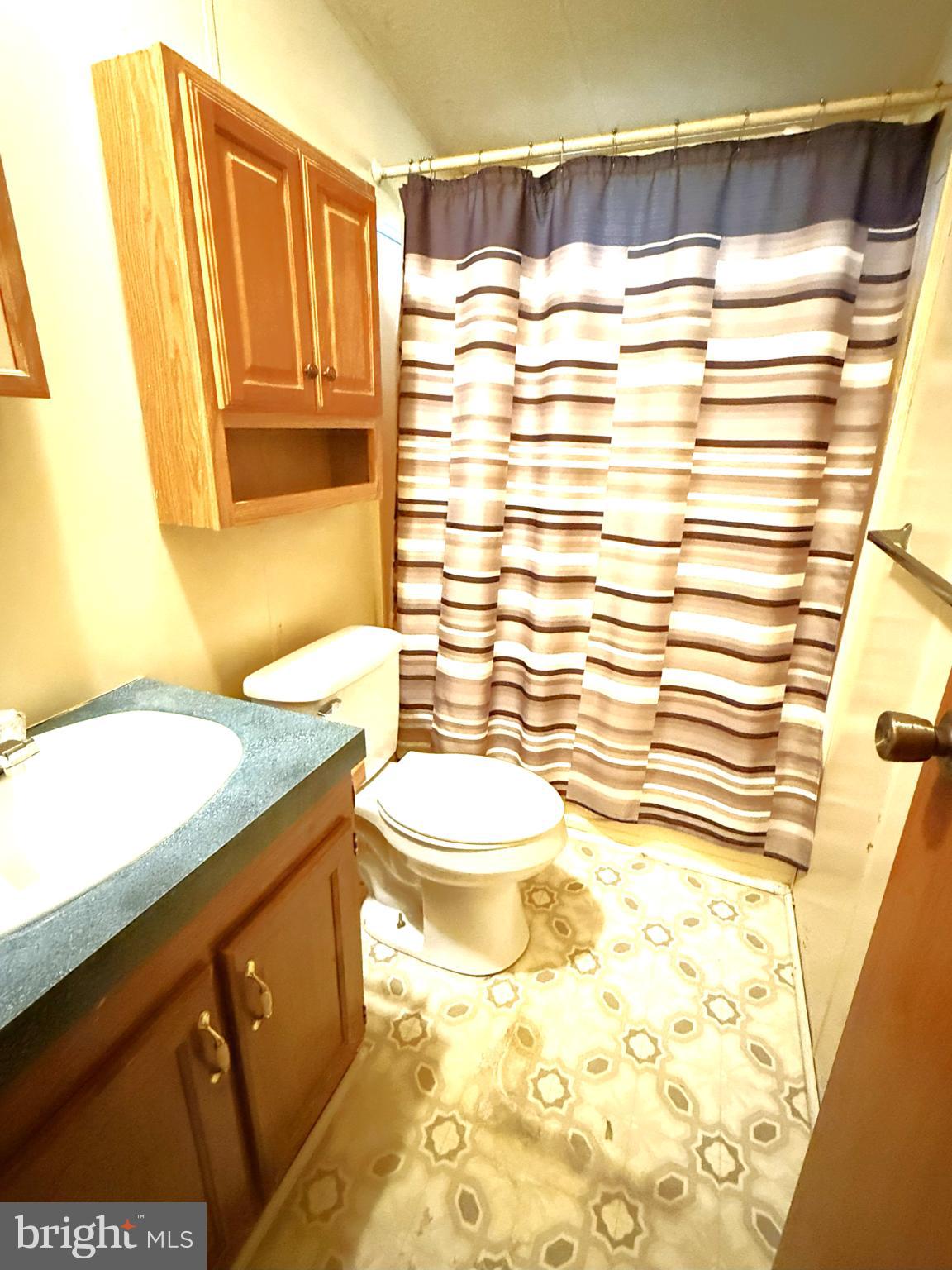 65 Big Spring Terrace Newville, PA 17241 - Photo 4 of 10 a bathroom with a sink and a mirror