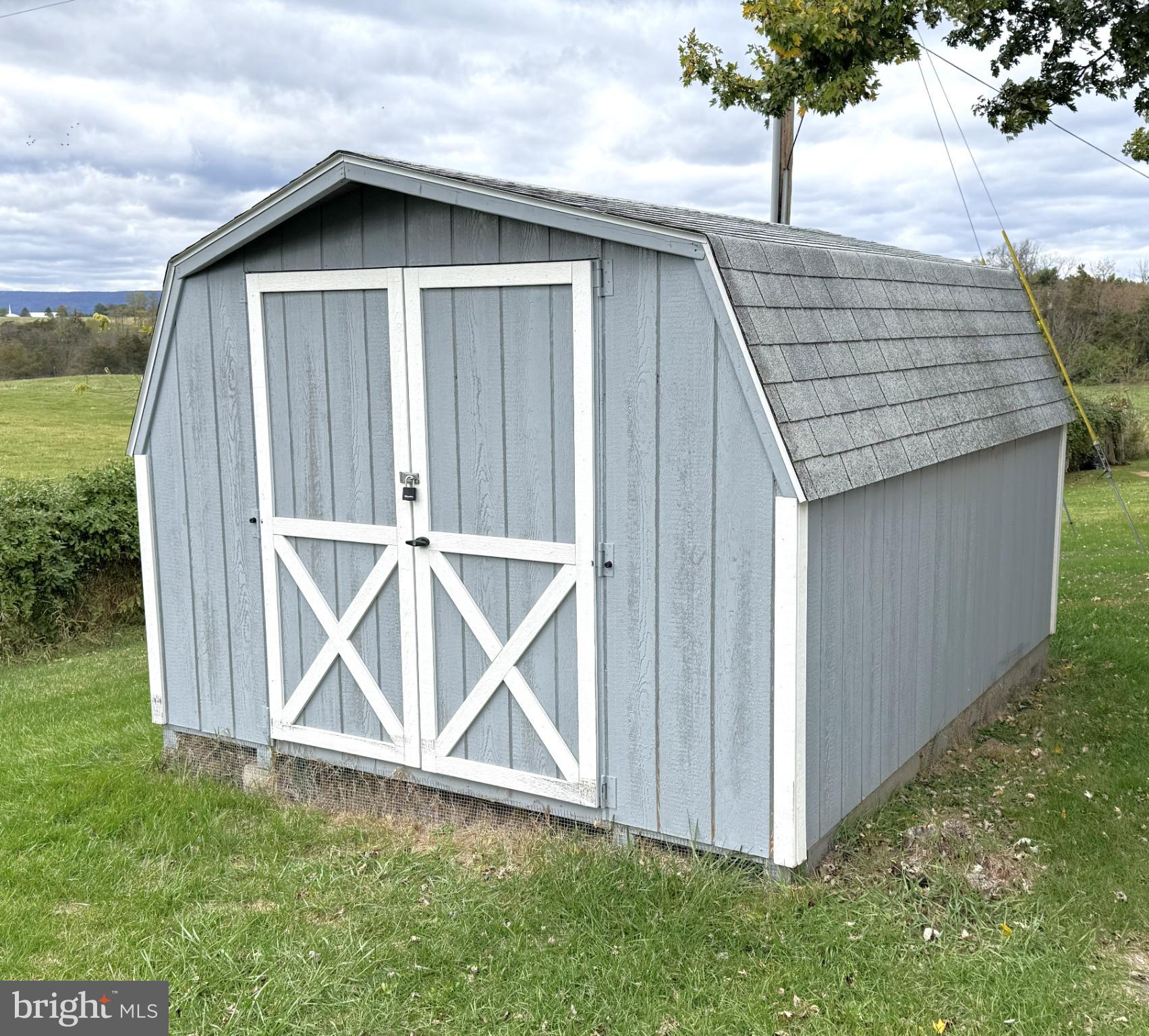 65 Big Spring Terrace Newville, PA 17241 - Photo 10 of 10 a front view of a house with garden