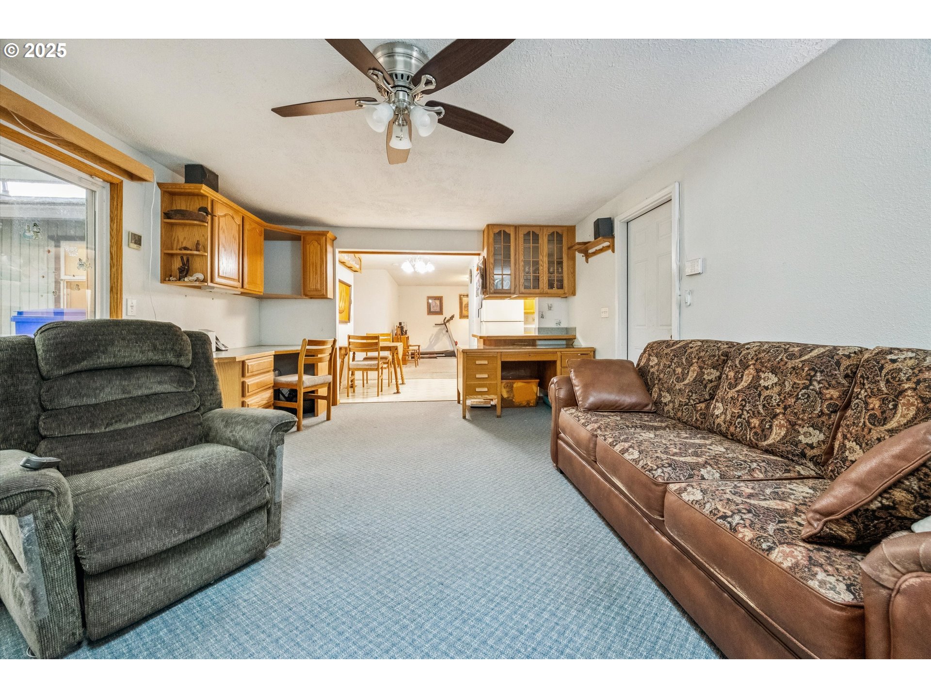 825 Northeast 194th Avenue Portland, OR 97230 - Photo 15 of 27 a living room with furniture a couch and dresser