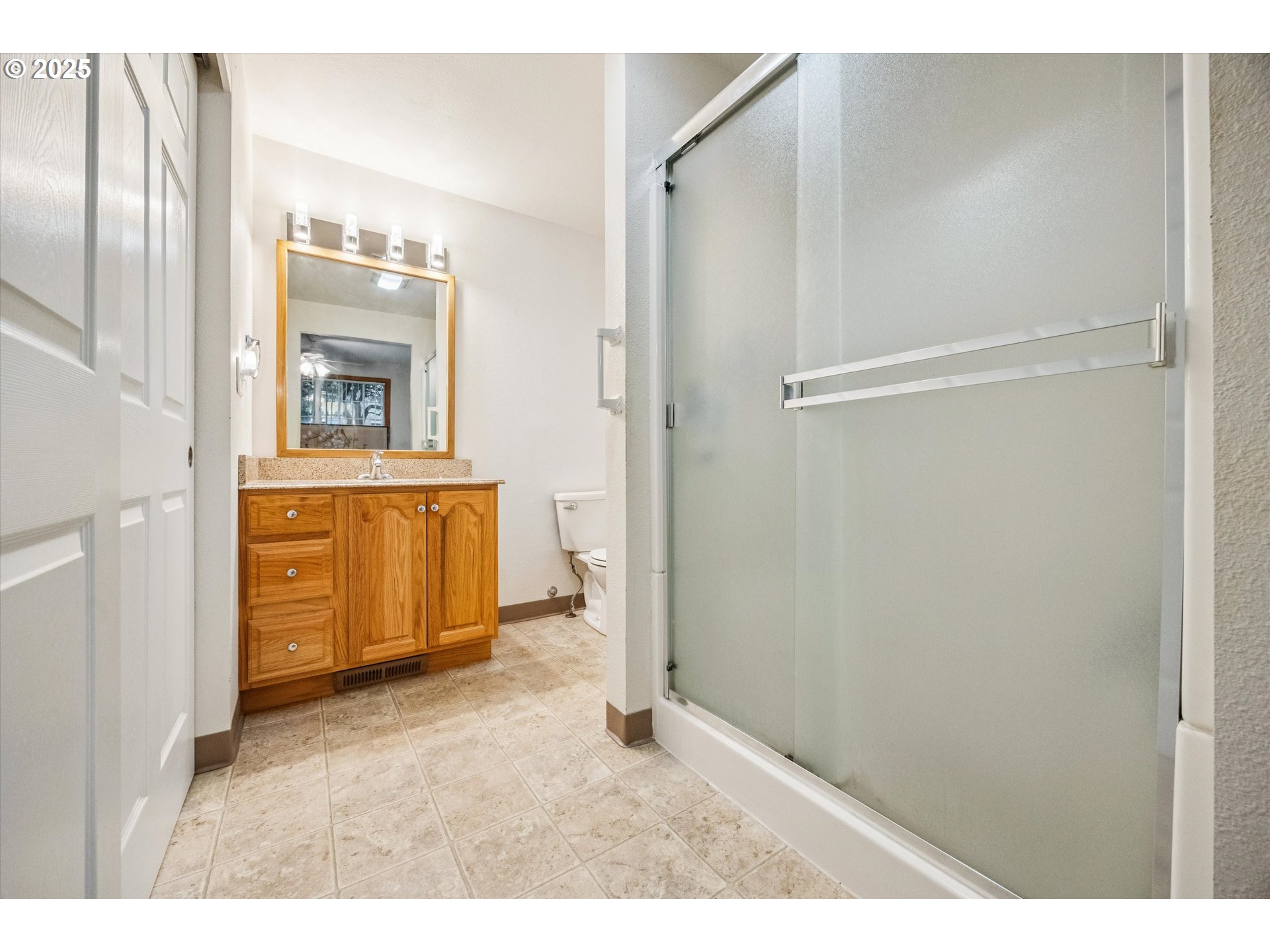 825 Northeast 194th Avenue Portland, OR 97230 - Photo 19 of 27 a view of an empty room with a window