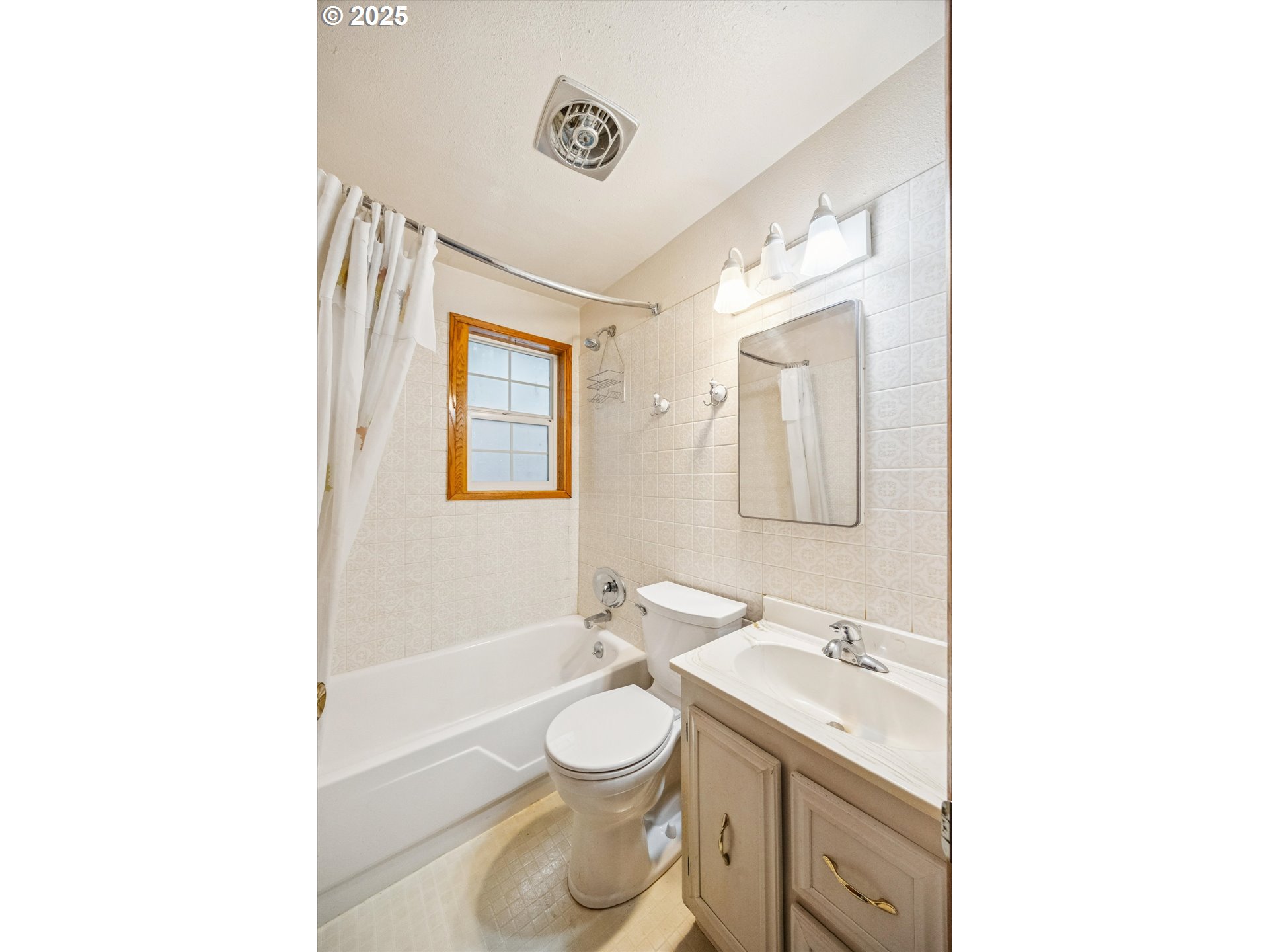 825 Northeast 194th Avenue Portland, OR 97230 - Photo 21 of 27 a bathroom with a toilet a sink a mirror and a shower
