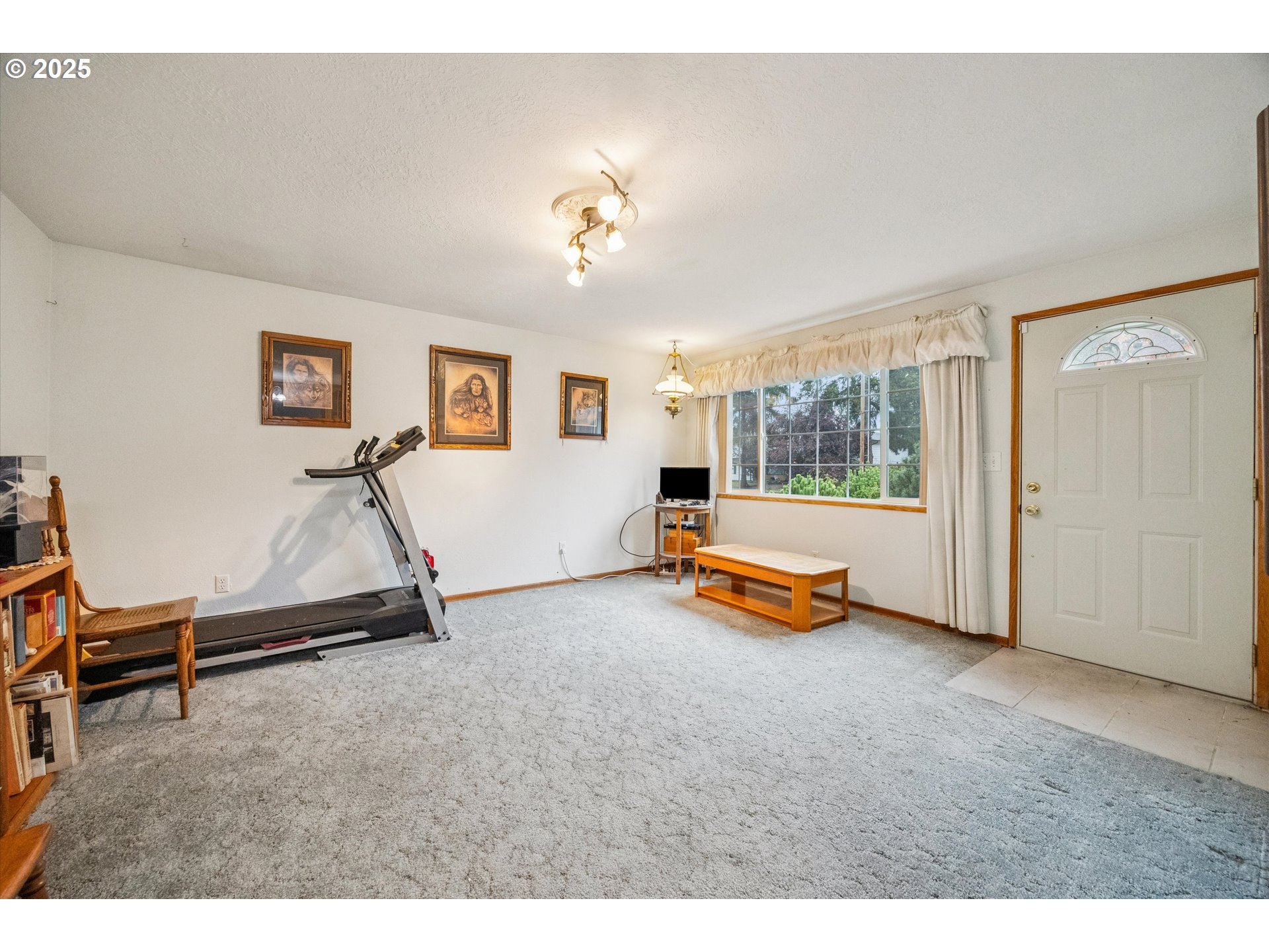 825 Northeast 194th Avenue Portland, OR 97230 - Photo 4 of 27 a view of a room with gym equipment