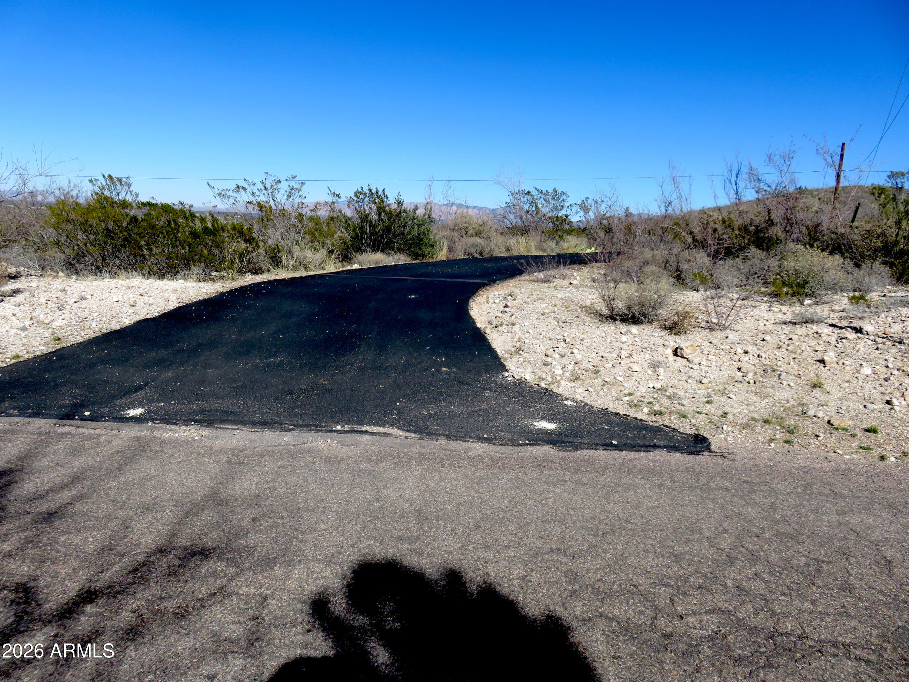 Tbd West Allen Street Tombstone, AZ 85638 - Photo 11 of 13 a view of a dry yard with wooden fence