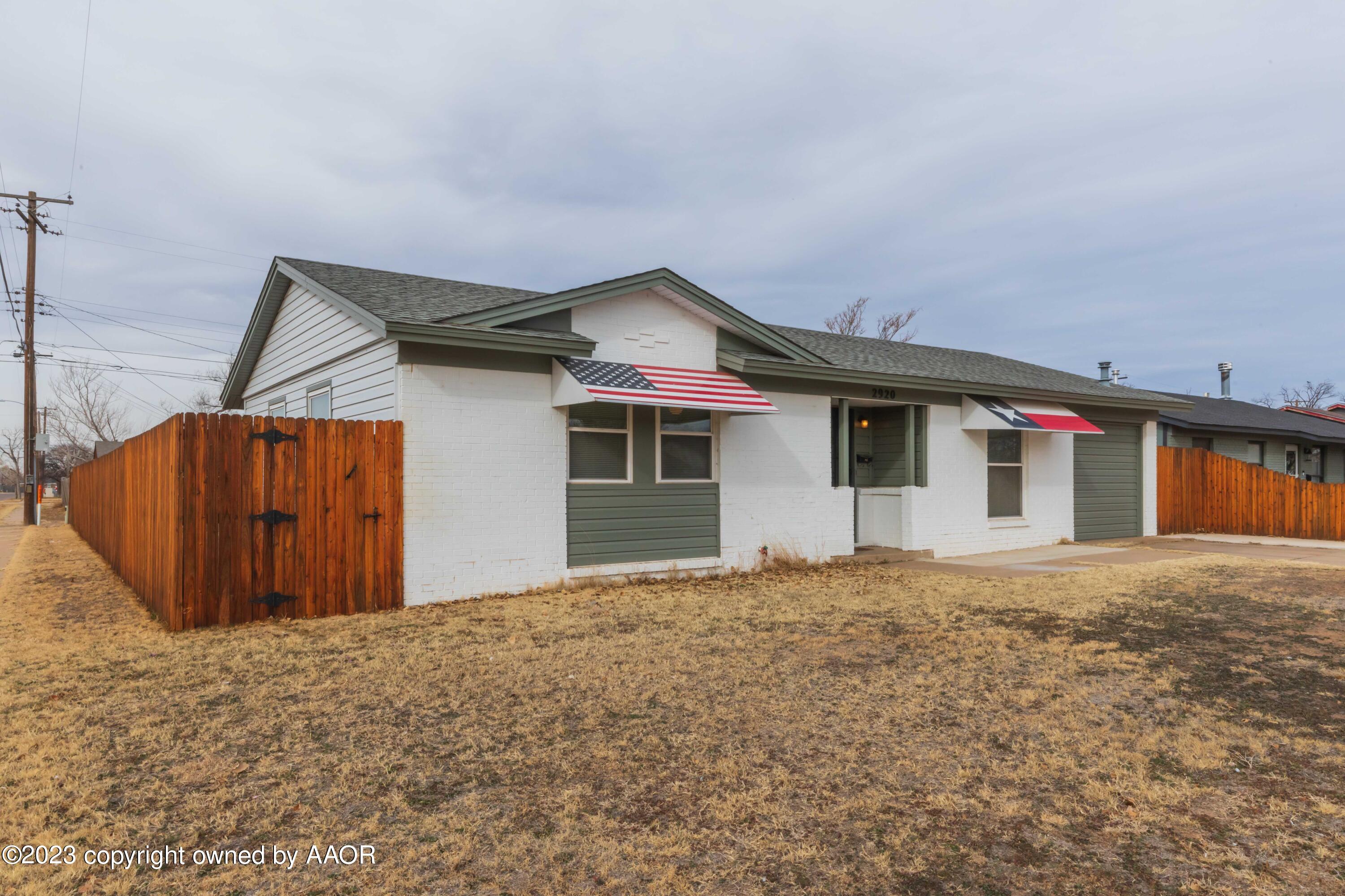 2920 South Nelson Street Amarillo, TX 79103 - Photo 2 of 47 a house with wooden fence
